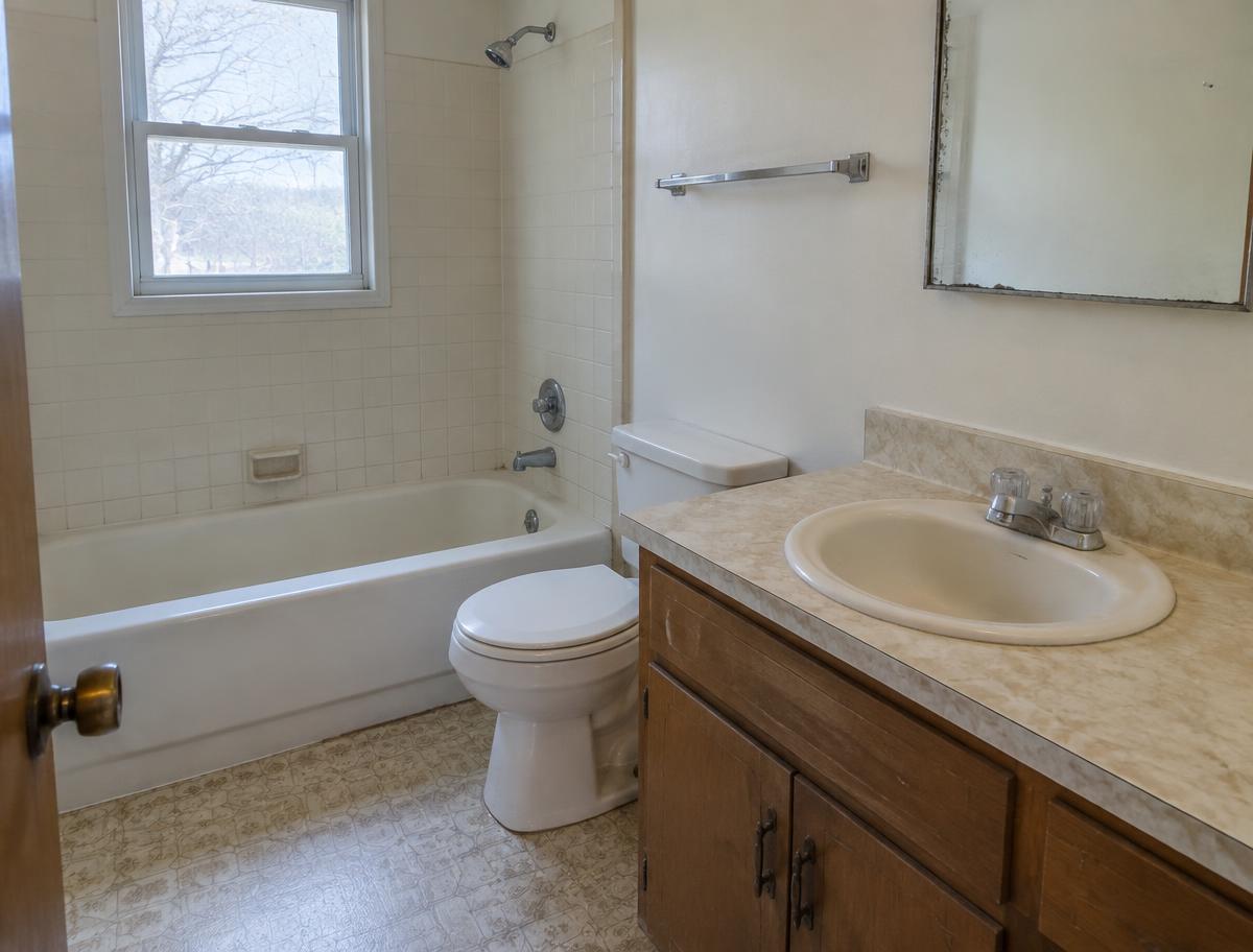Bathroom plumbing refresh — before